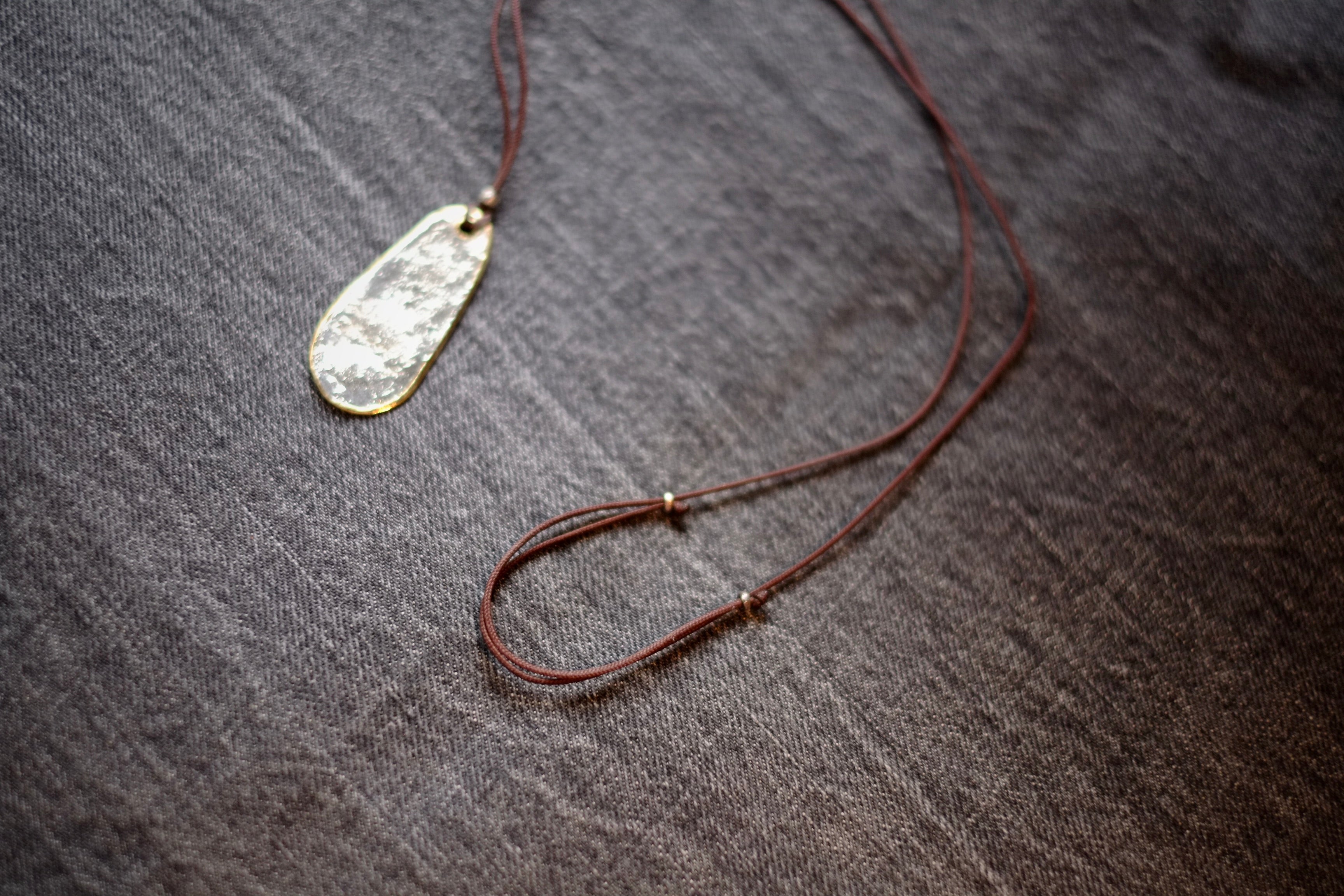 Taupe D motoike - Island Cord Necklace”Oval